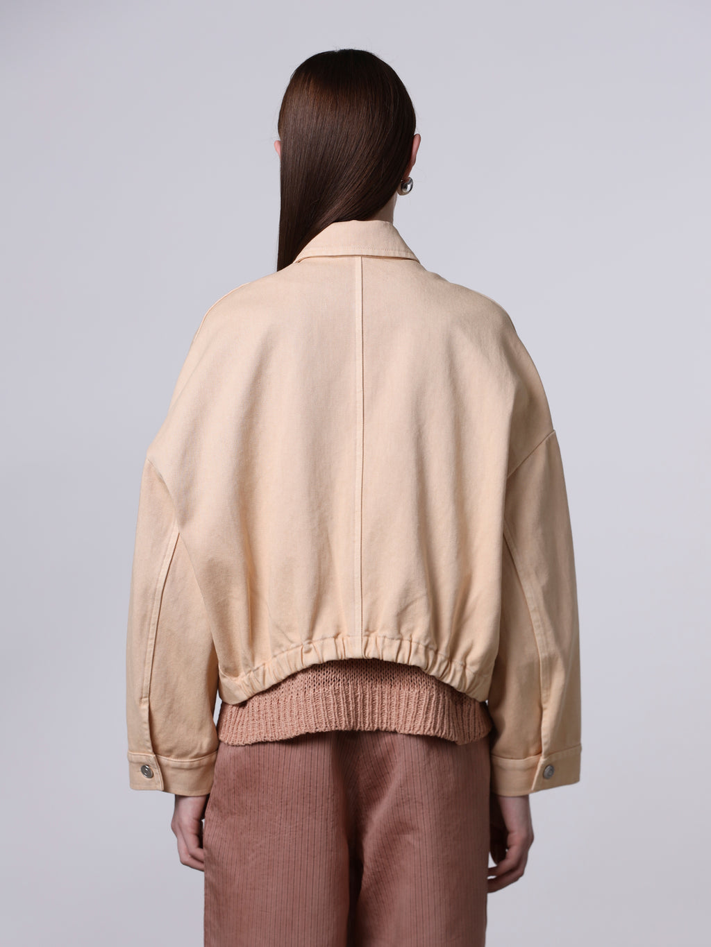 Jacket with gathered hem